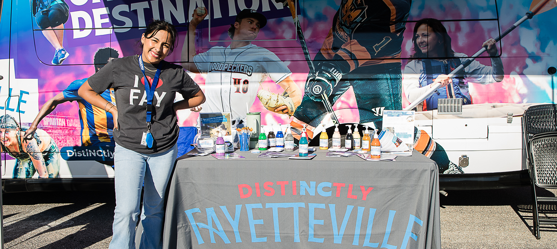 Outdoor event table with Fayetteville merchandise
